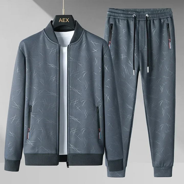 Men's stylish tracksuit set in graphite, featuring a modern bomber jacket and comfortable jogger pants for casual wear.