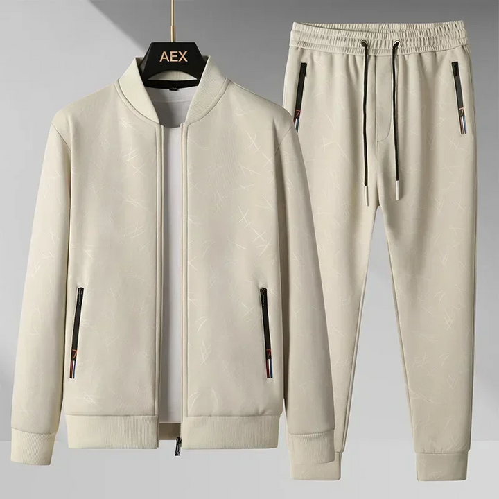 Sandstone men's jogger set with a contemporary bomber jacket, perfect for athletic wear or urban streetwear style.