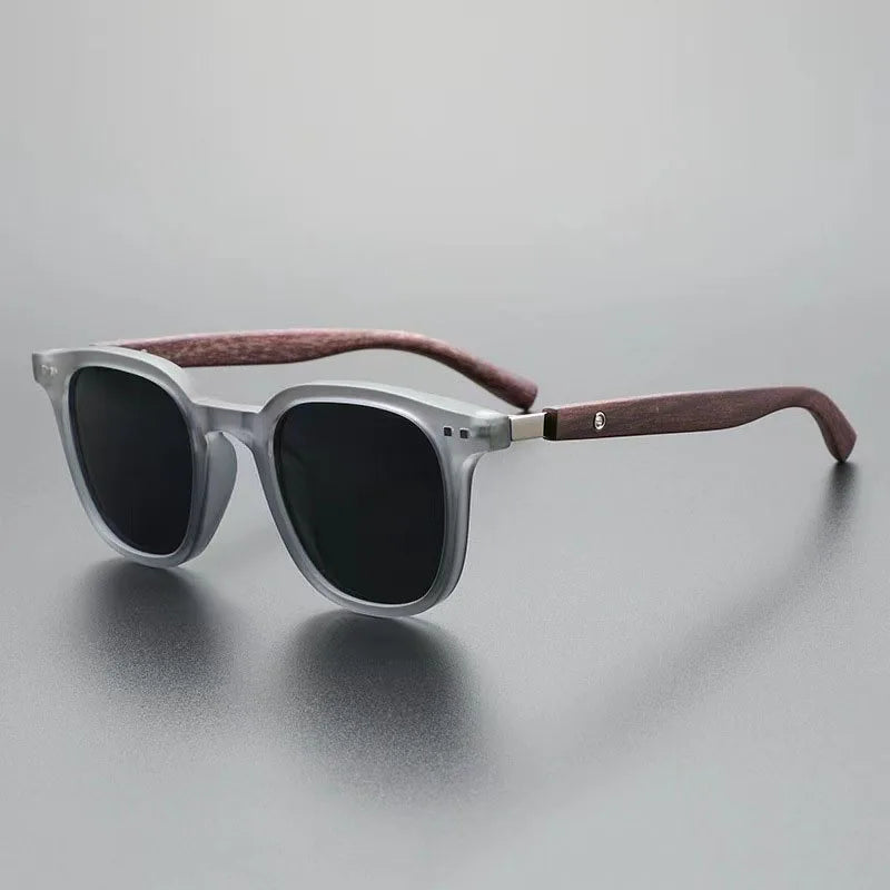 Fashionable men's polycarbonate sunglasses with wood accents, offering 100% UV protection.