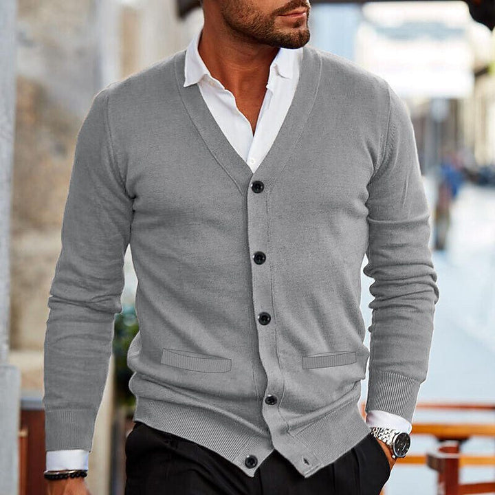 Stylish men's V-neck cardigan, a key piece for any wardrobe. Easily pairs with shirts for a polished layered look.
