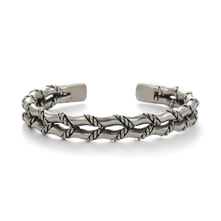 Men's stylish wooden inlay bracelet featuring a stainless steel Cuban link chain. Unique and adjustable jewelry.