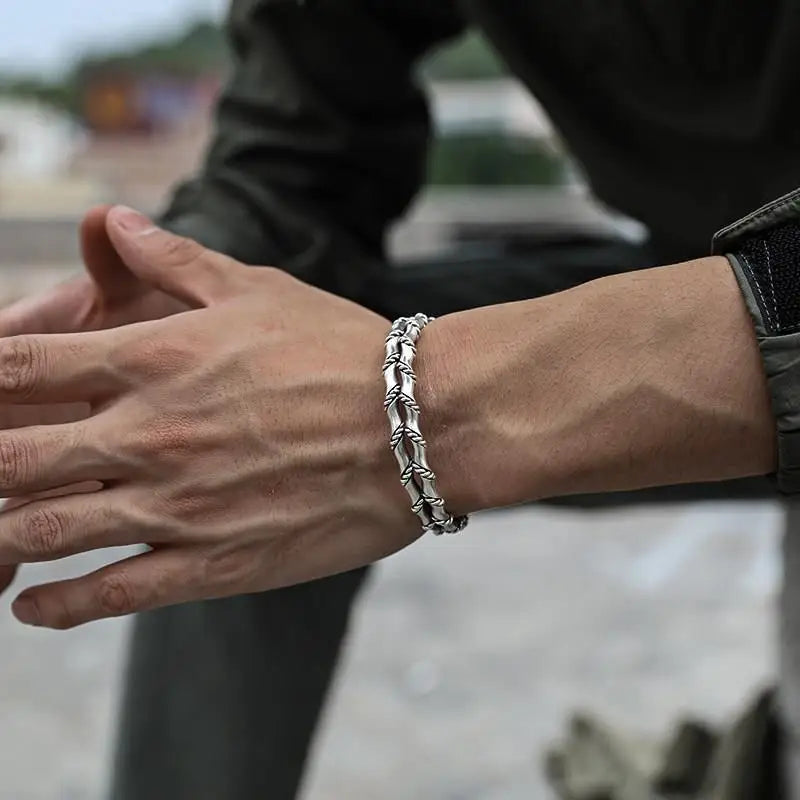 Stylish men's bracelet with unique wooden inlay on a durable stainless steel band. Perfect gift for him.