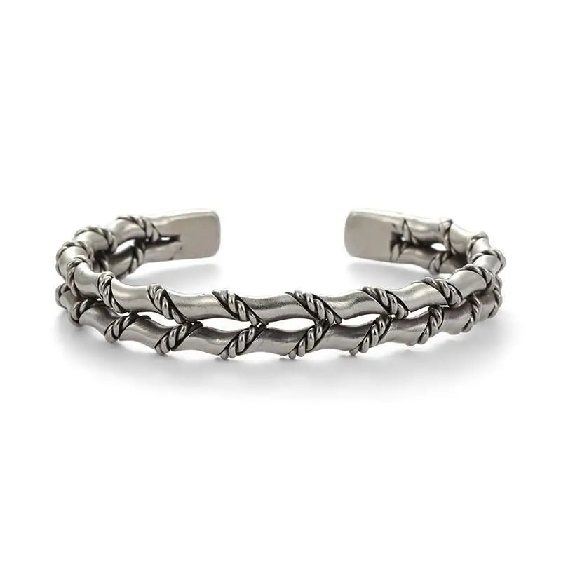 Adjustable men's stainless steel Cuban link bracelet with a distinctive wooden inlay. Modern men's jewelry.
