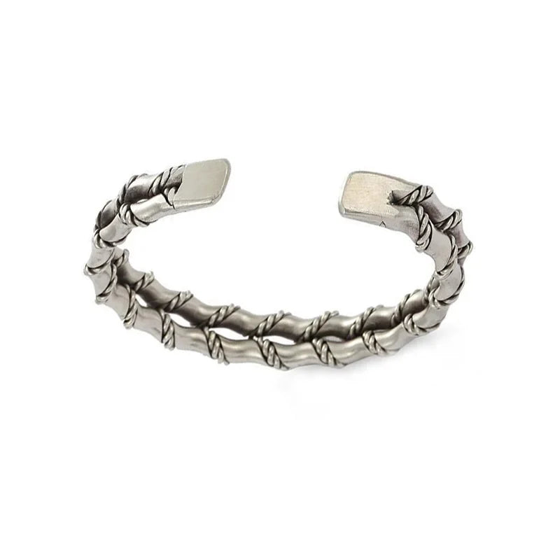 Distinctive men's bracelet combining natural wood inlay and polished stainless steel. Stylish gift idea.