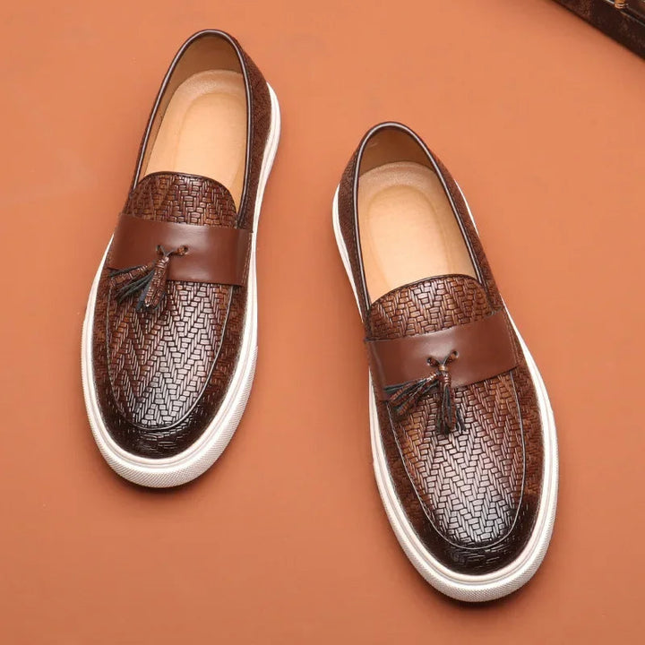 Comfortable men's slip-on loafers. Soft, woven design with classic tassels, perfect for easy all-day wear and style.