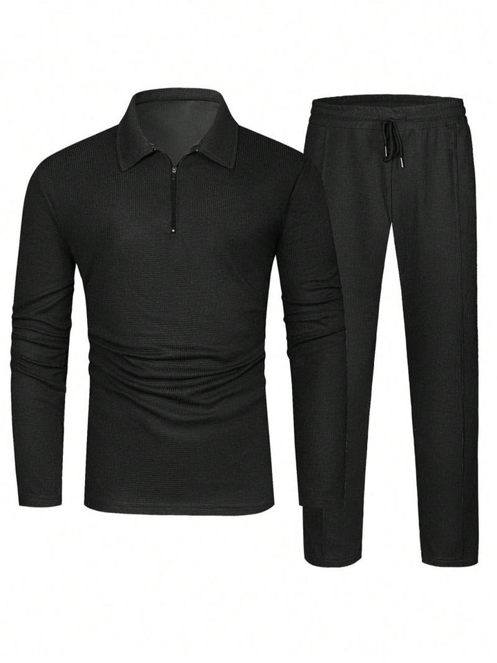 Close-up of men's zip-neck lounge top, highlighting modern style, comfort, and soft cotton blend fabric.
