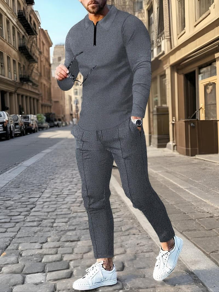 Men's modern zip-neck lounge set for ultimate comfort. Stylish two-piece cotton blend, perfect for casual men's fashion.