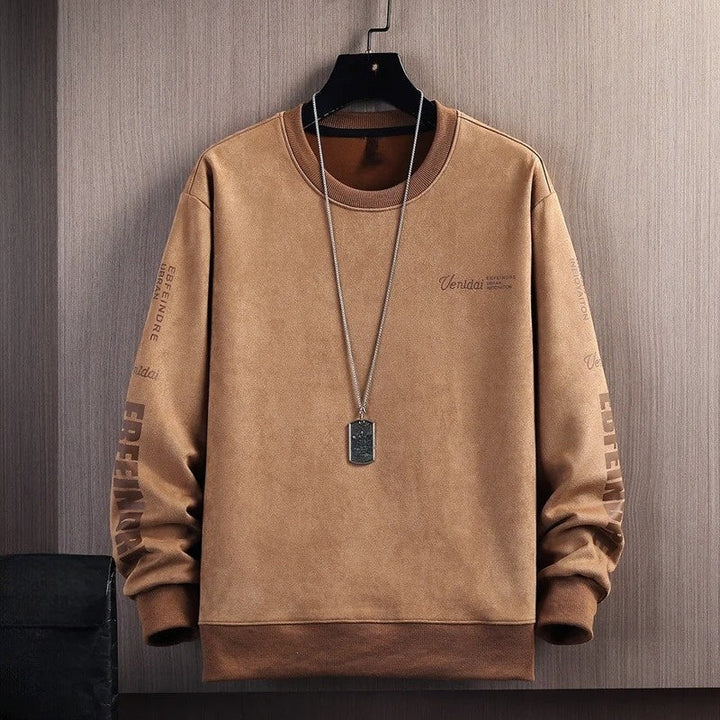 Soft touch men's crewneck pullover with suede-like feel. Comfortable and fade-resistant casual wear for men.