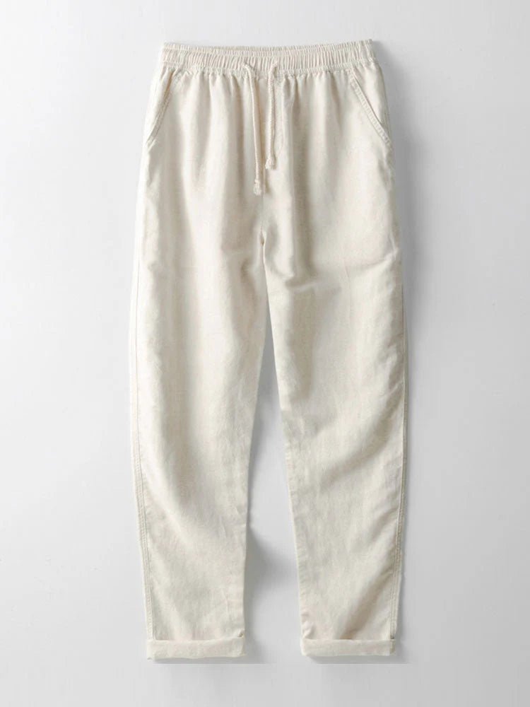 Men's summer outfit set featuring a casual shirt and pants with stylish rolled cuffs. Relaxed fit for ease.