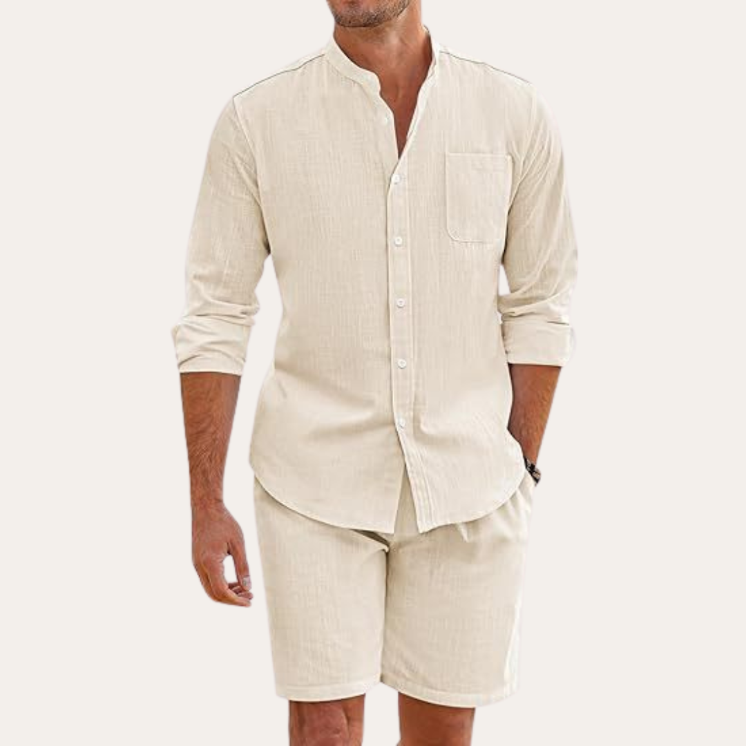 Men's relaxed fit summer two-piece set featuring long sleeve mandarin collar shirt & casual shorts. Ideal casual wear.
