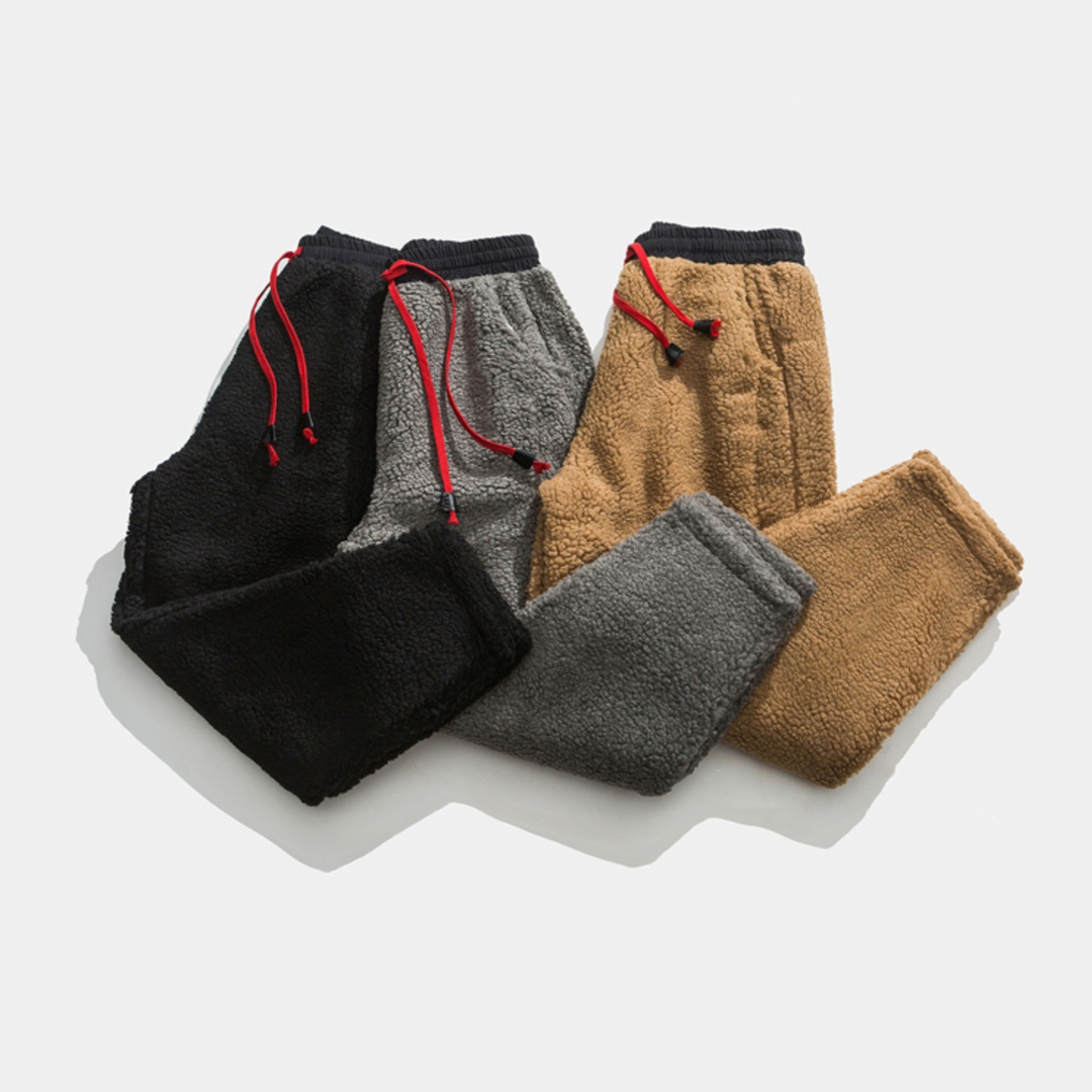 Stylish & comfortable men's sherpa joggers, offering a relaxed fit and cozy winter warmth.