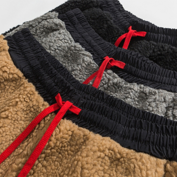 Enjoy plush comfort with men's Summit Sherpa Jogger Pants, ultimate relaxed fit lounge wear.