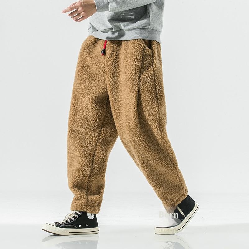 Relaxed fit men's joggers, soft sherpa fleece for casual wear and ultimate comfort.