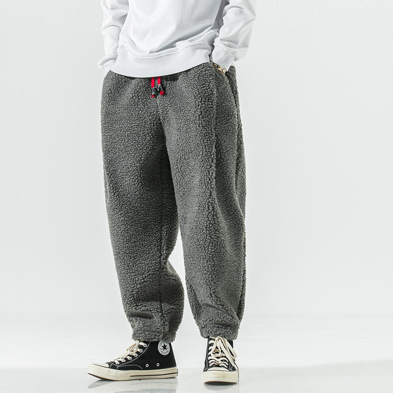 Men's cozy fleece joggers, providing plush sherpa comfort and warmth for lounge or casual.