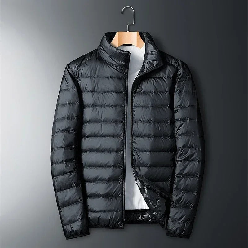 Men's Summit Thermal Jacket for extreme cold, a warm winter coat ideal for outdoor activities.