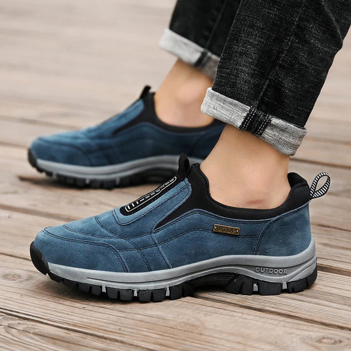 Durable men's supportive orthopedic hiking shoes with traction for rugged outdoor adventures.