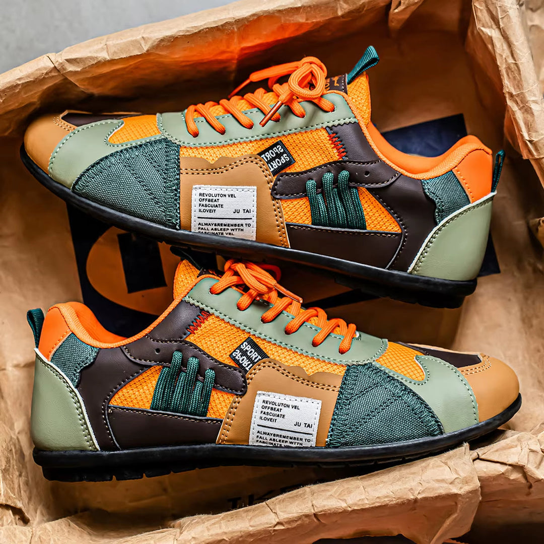 Men's Surge multi-panel athletic trainers, vibrant design, cushioned for all-day comfort & everyday wear.