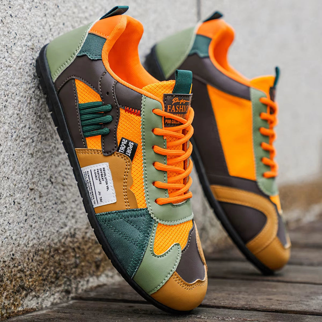 Side view of Men's Surge multi-panel athletic trainers, streetwear sneakers with dynamic vibrant panels & grip sole.