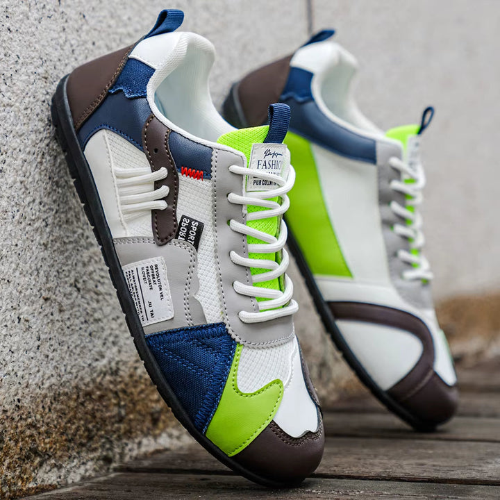 Men's Surge trainers showcasing durable grip sole, multi-panel design for stability & all-day comfort.