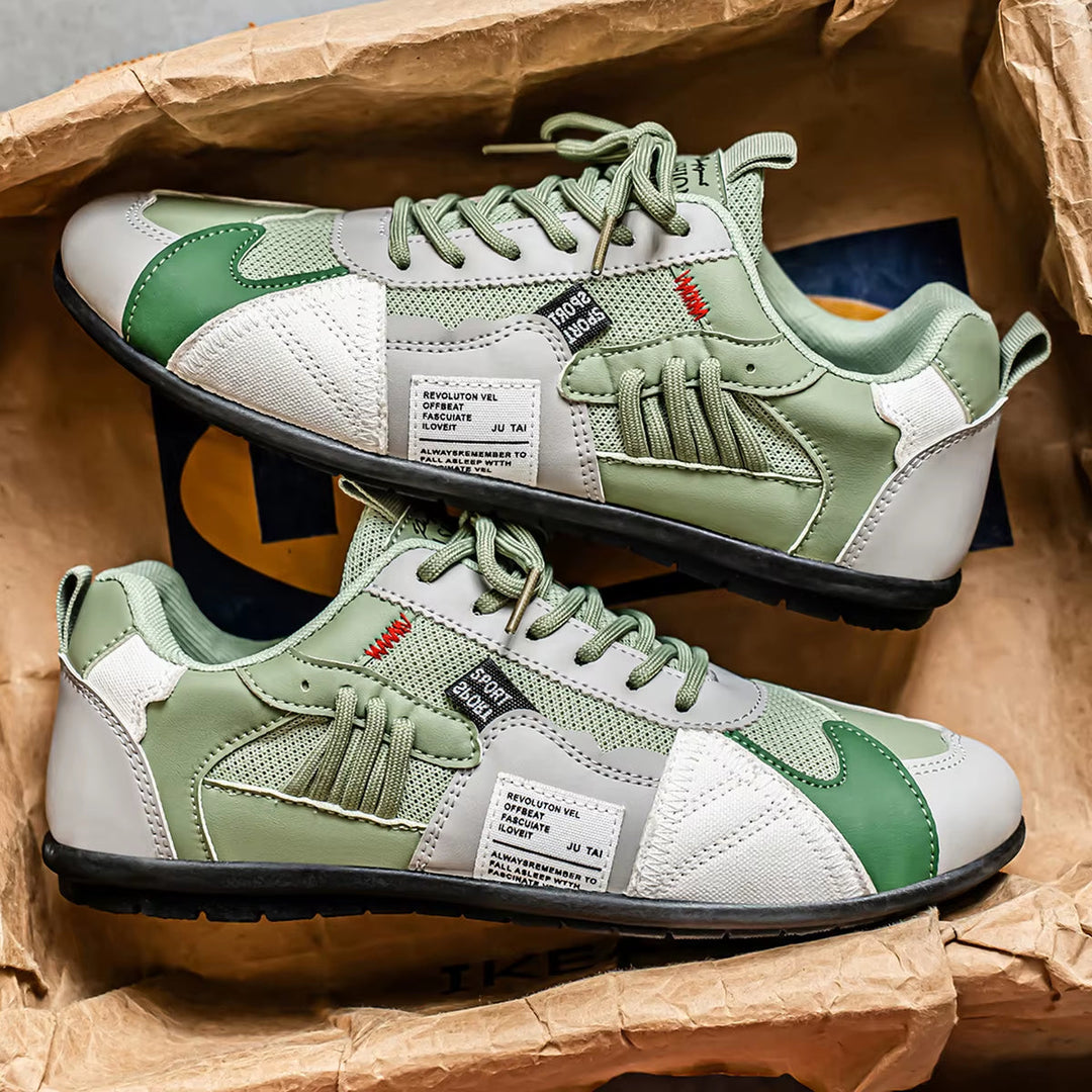 Back view of Men's Surge cushioned athletic trainers, multi-panel streetwear sneakers offering all-day comfort.