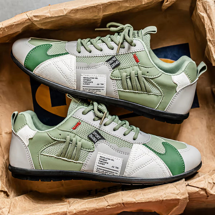 Back view of Men's Surge cushioned athletic trainers, multi-panel streetwear sneakers offering all-day comfort.