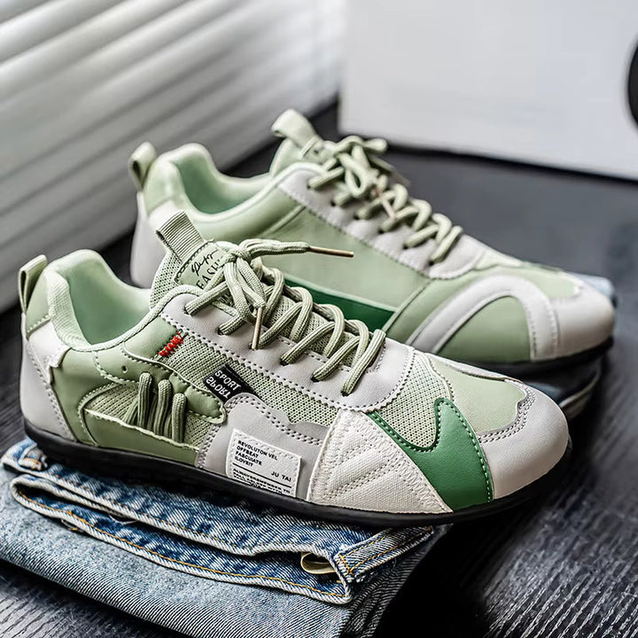 Men's Surge durable multi-panel athletic trainers, cushioned for all-day comfort & everyday wear sneakers.