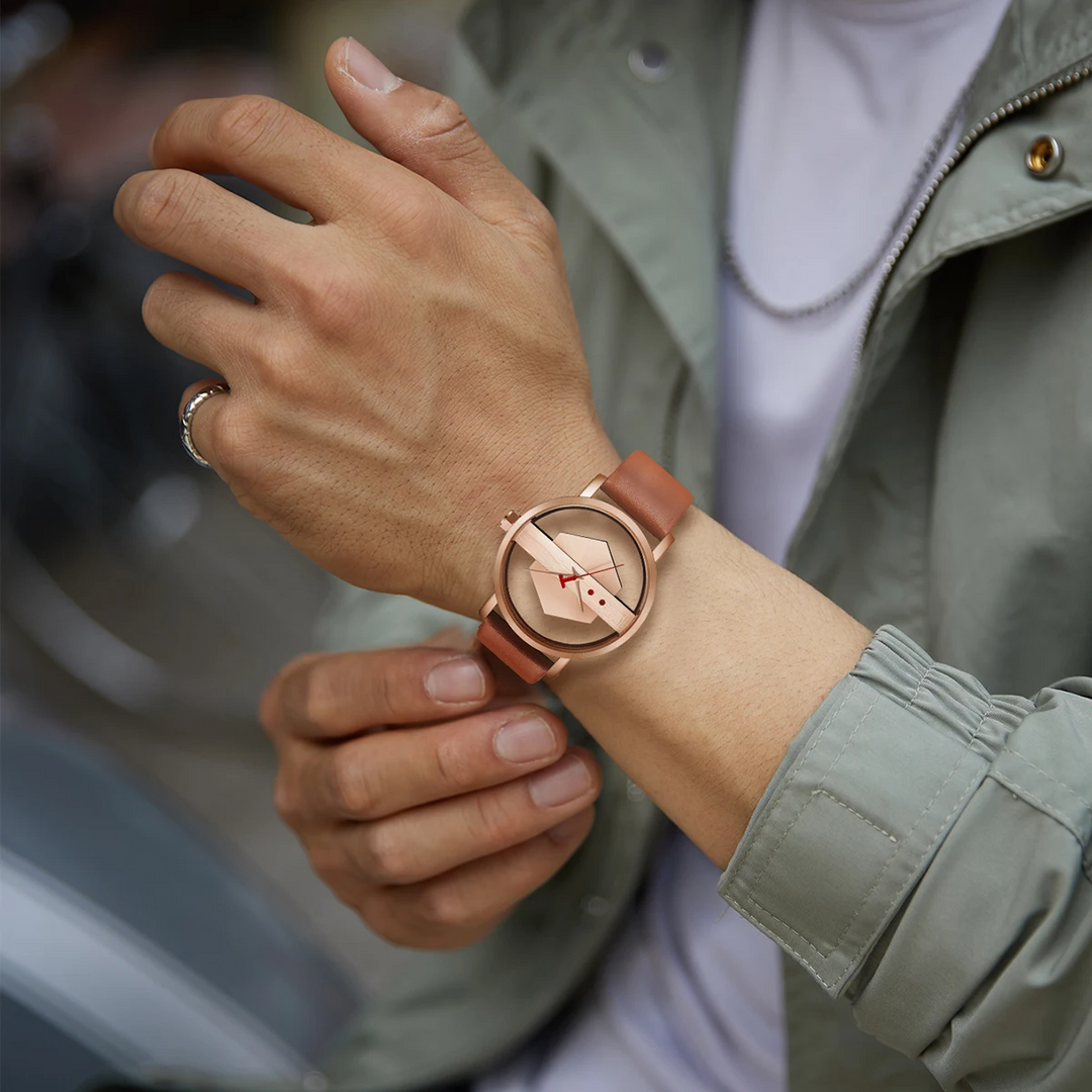 Lifestyle shot: Man wearing a unique Surreal Orbiting Hex-Core Dial Watch, modern accessory.