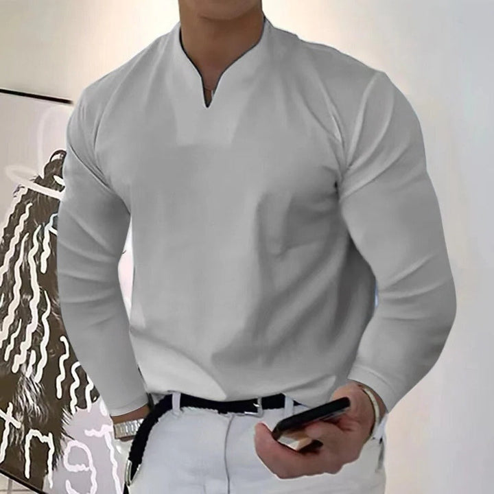 Soft, breathable men's V-neck shirt with advanced sweat-proof fabric technology.
