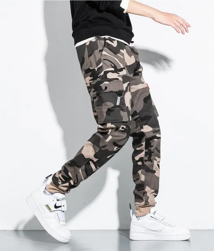 Men's fashion camo cargo joggers, tapered fit, showcasing a blend of athletic and utility styles.
