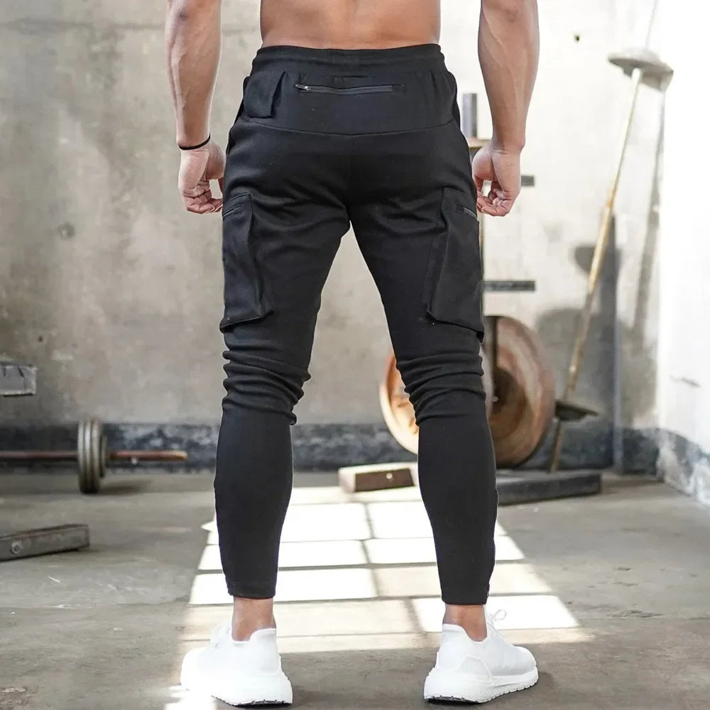 Active men's tactical cargo joggers. Utility design, great for gym & performance.