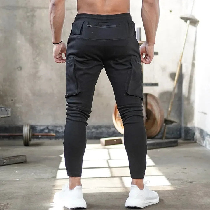 Active men's tactical cargo joggers. Utility design, great for gym & performance.