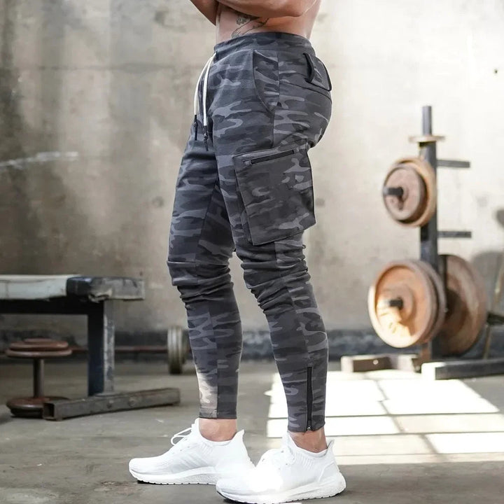 Men's tactical training pants. Cargo pockets, tapered fit, ideal for active lifestyles.