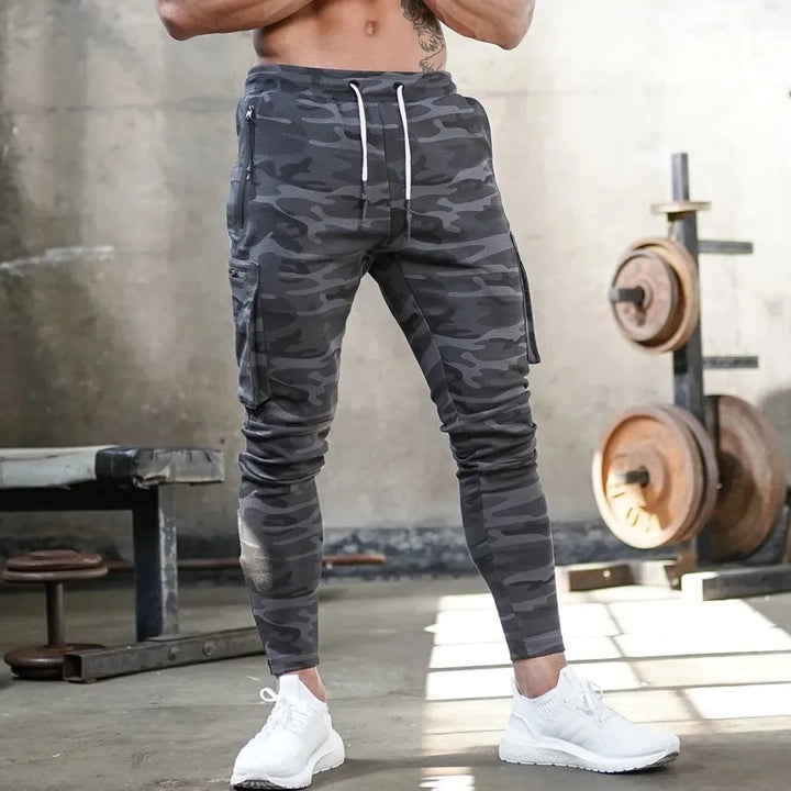 Men's athletic cargo joggers. Tactical styling, sweat-wicking for intense workouts.