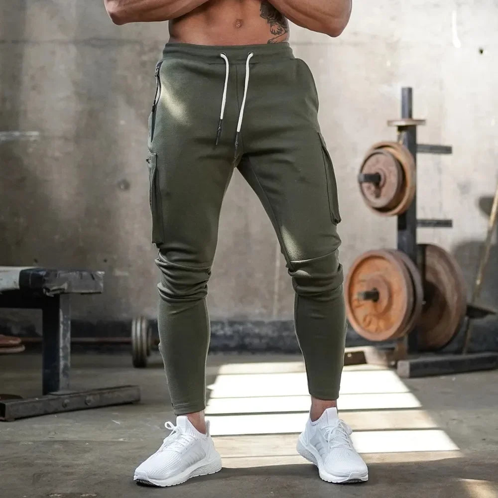Performance men's joggers, tactical cargo style for workouts. Sweat-wicking fabric.