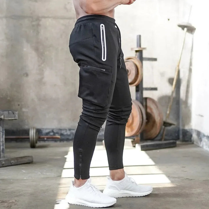 Men's sweat-wicking tactical cargo joggers. Tapered fit for training & athletic wear.