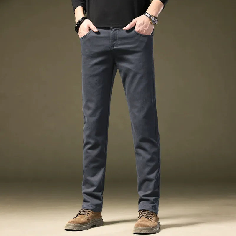 Men's tailored cotton trousers, comfortable & modern for smart casual or elegant menswear.