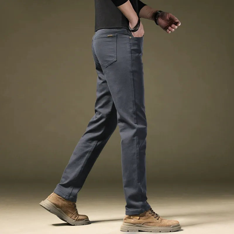 Black tailored cotton trousers for men, elegant & comfortable, perfect for modern menswear.