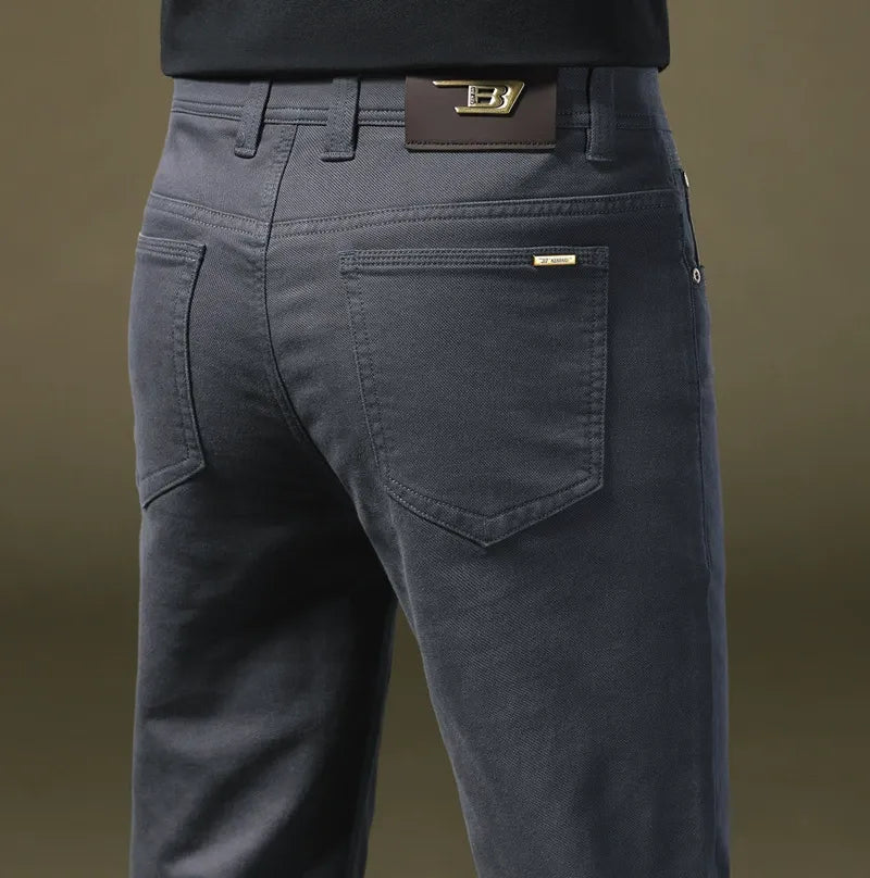 Khaki men's tailored cotton trousers, comfortable & versatile for casual or smart-casual wear.