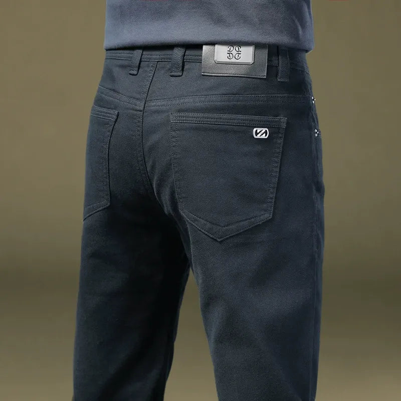 Modern men's tailored cotton trousers, sleek and comfortable, perfect for a refined look.