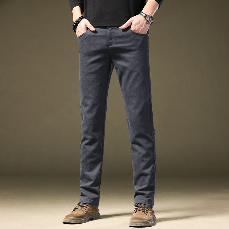 Close-up of comfortable tailored cotton trousers for men, showcasing refined fabric texture.