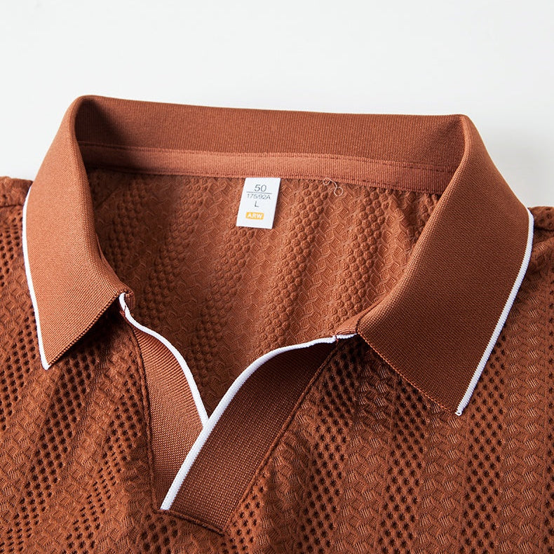 Stylish men's collared polo shirt, knitted & tailored fit, perfect for warm weather and smart casual.