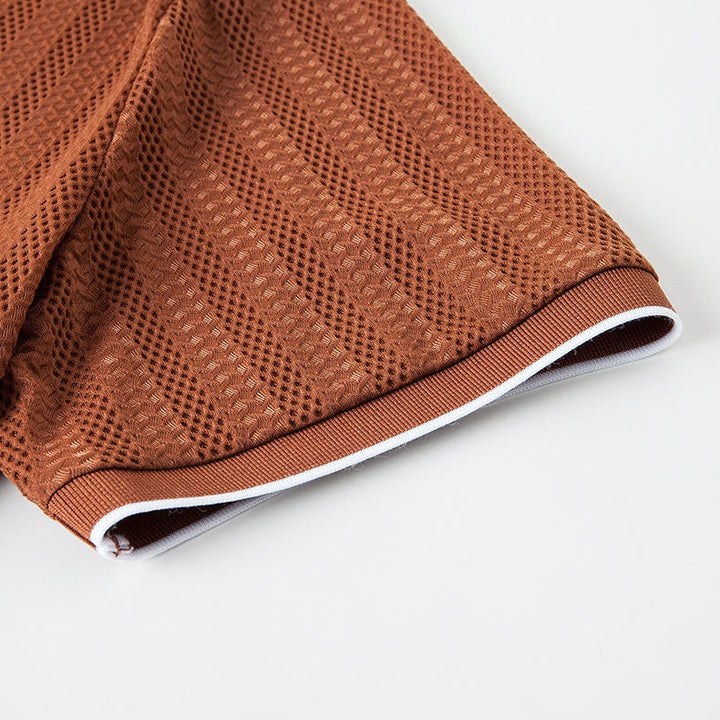 Tailored fit men's short sleeve knitted polo shirt, lightweight, breathable, and comfortable for summer.