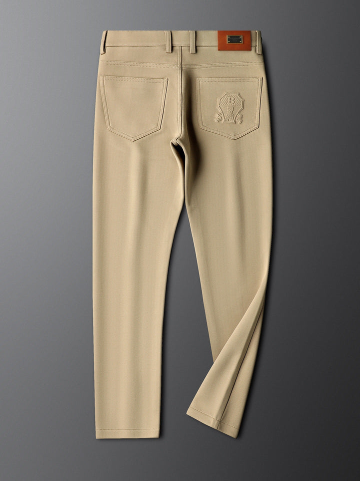 Elegant men's tailored trousers with a distinctive herringbone weave.
