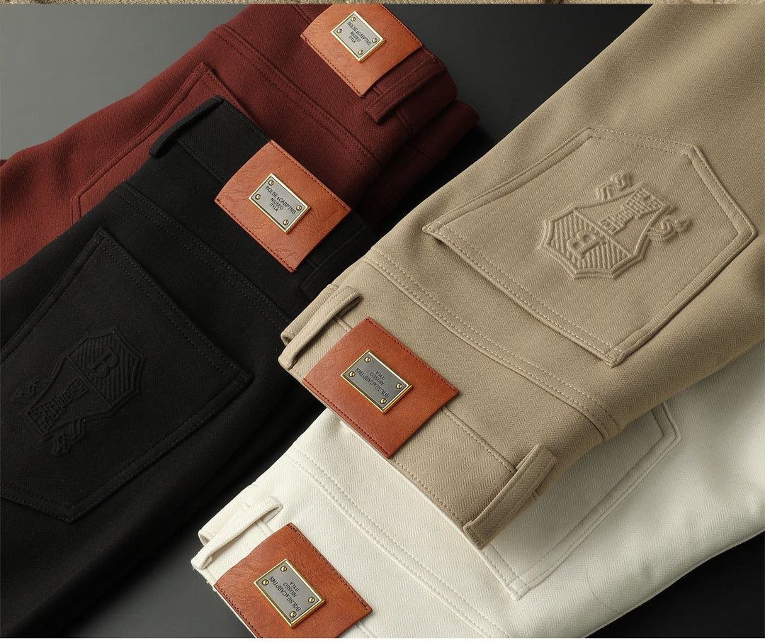 Fashionable men's tailored trousers, herringbone texture for a refined look.