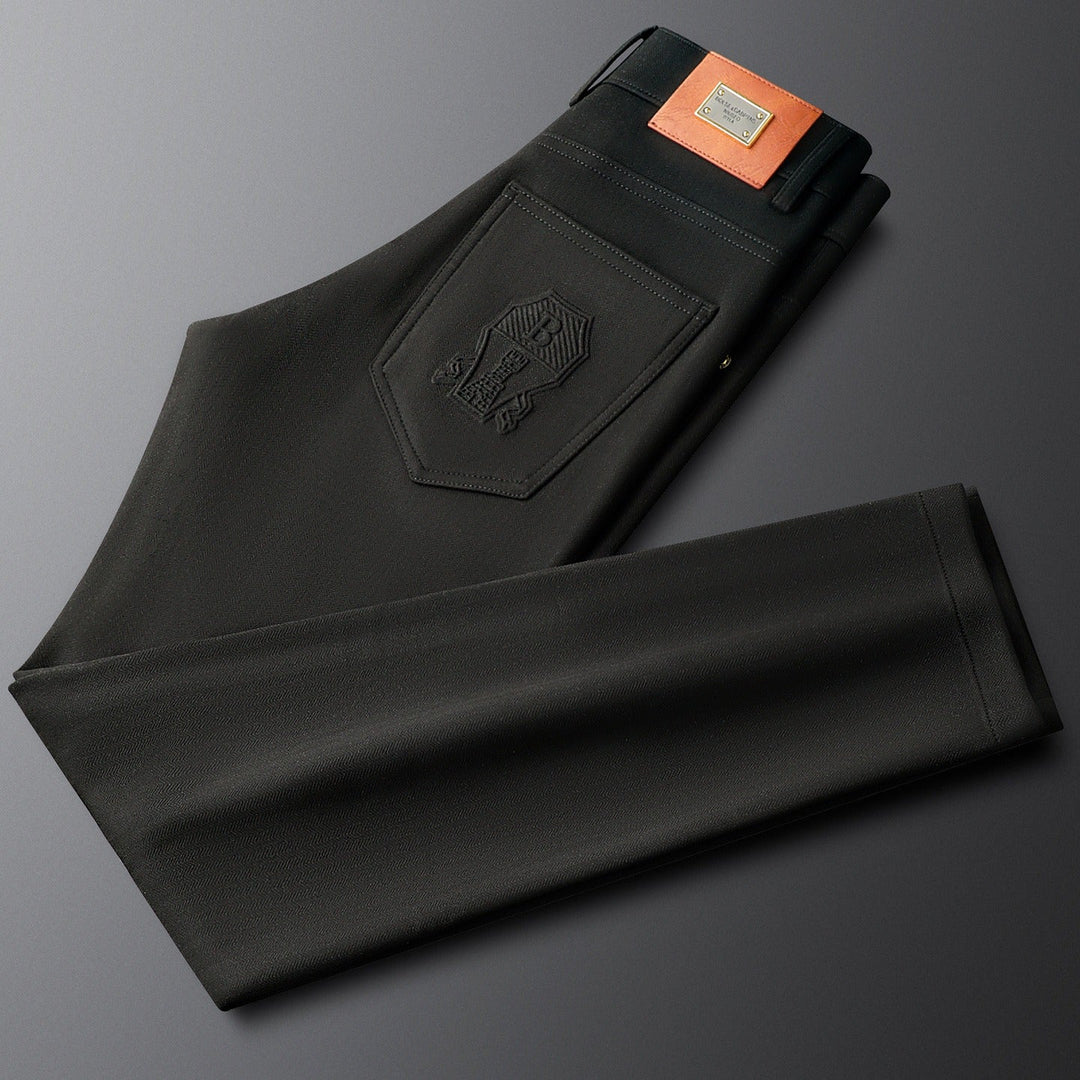 High-quality men's tailored trousers, herringbone texture for a smart look.