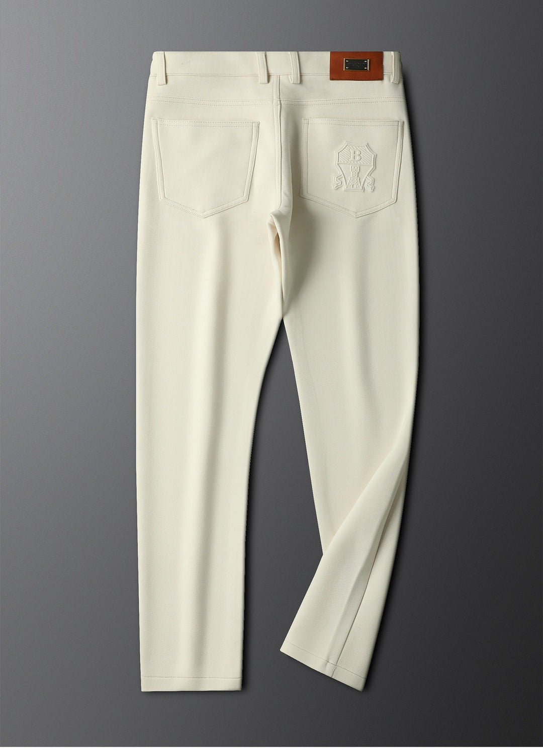 Classic men's herringbone trousers, tailored for a sharp, elegant silhouette.