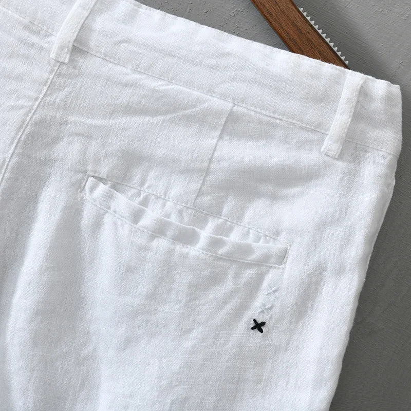 Lightweight, breathable men's tailored linen shorts, perfect for summer days.