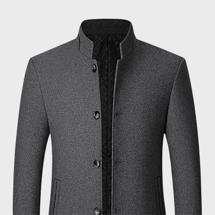 Durable men's business trench coat. Tailored fit with a classic stand collar for men's fashion.