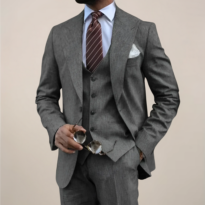 Classic black men's three-piece tailored suit. Perfect formal wear for business, executive events, and weddings.