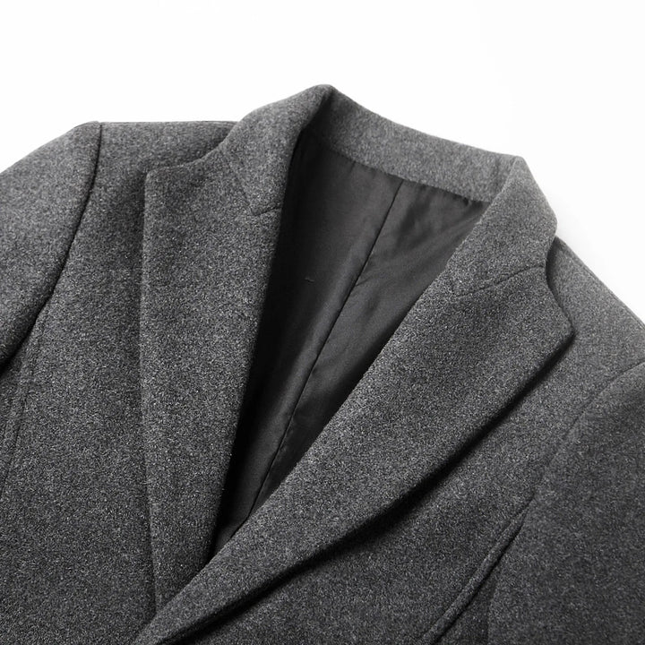 Elegant men's formal trench coat with sharp notch lapel, suitable for evening wear and professional events.